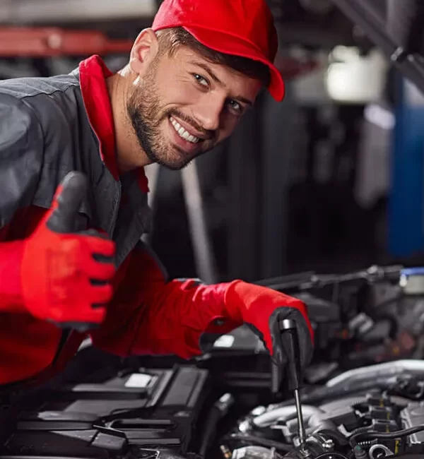 Mechanic is checking car.